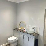 Bathroom with slate floor and Goose Down walls
