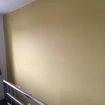 Bedroom feature wall in Golden Sands paint.